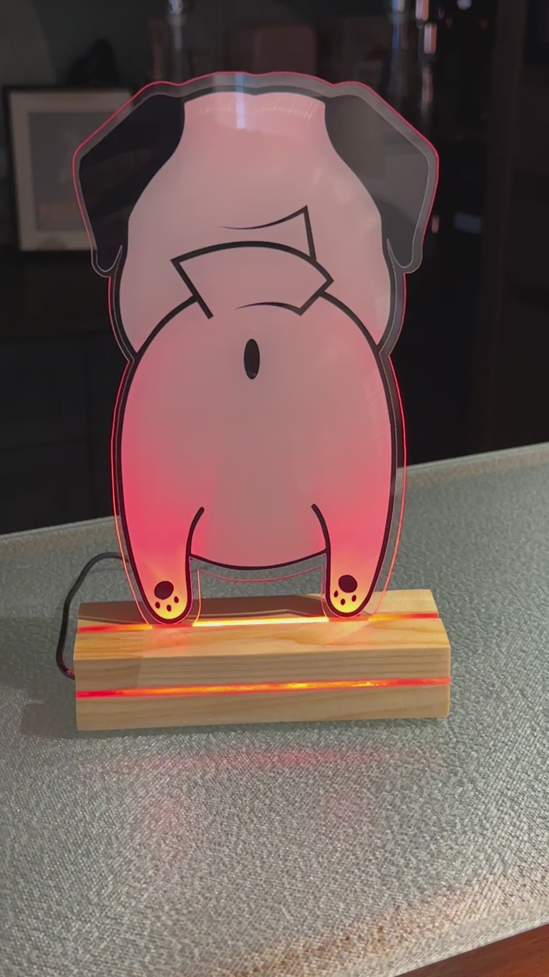 Video showing the LED lights changing on Pug Butt night light.