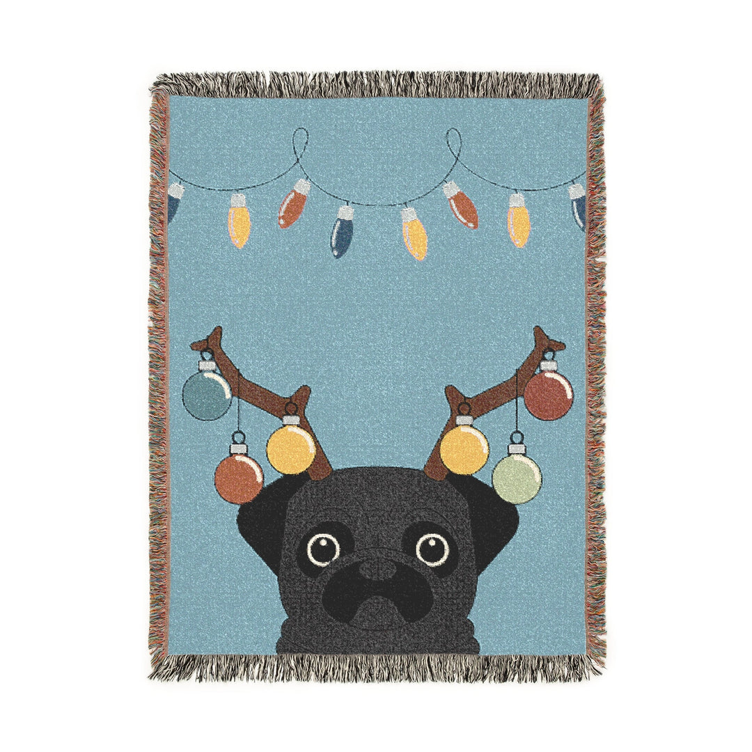 Woven blanket with a black cat and colorful lights design on a blue background