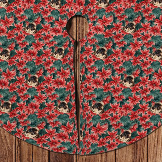 Christmas tree skirt with poinsettia pattern on a wooden surface